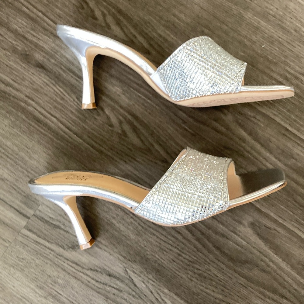 Sparkling sandals with a heel and square toe, tapered heel make this a fun shoe